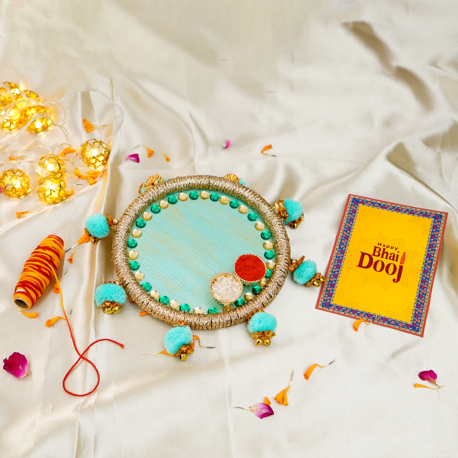 Handcrafted Sea-Green & Gold Bhai Dooj Pooja Thali Set – Includes Designer Greeting Card, Sacred Moli Thread, and Beaded Pom-Pom Decor