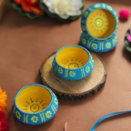 Hand-Painted Terracotta Dekhchi Diya Set – 4-Piece Artisanal Floral Oil Lamps for Festive Decor