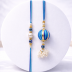 Striped Pom-Pom Evil Eye Bhai-Bhabhi Rakhi Set