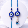 Circular Beaded Evil Eye Bhai-Bhabhi Rakhi Set