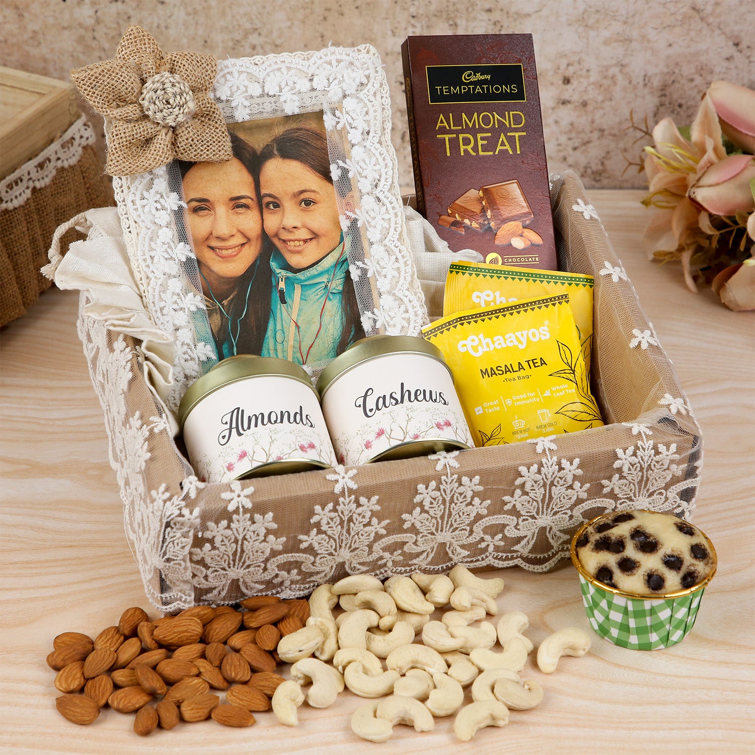 Personalized Mother’s Day Gourmet Gift Hamper – Lace-Trimmed Photo Frame, Premium Dry Fruits, Cadbury Temptations & Masala Tea Set in a Decorative Basket
