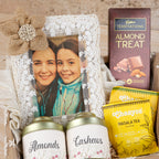 Personalized Mother’s Day Gourmet Gift Hamper – Lace-Trimmed Photo Frame, Premium Dry Fruits, Cadbury Temptations & Masala Tea Set in a Decorative Basket