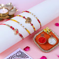 Ganesha Rakhi Set of 4 – Premium Designer Rakhis with Puja Thali & Roli Chawal