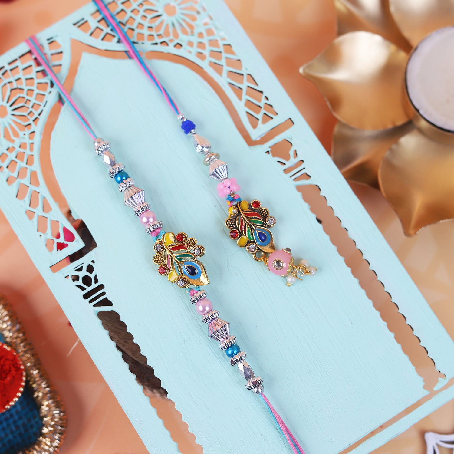 Handcrafted Designer Peacock Pair Rakhi Set - Set of 2 with Matching Mini Puja Thali