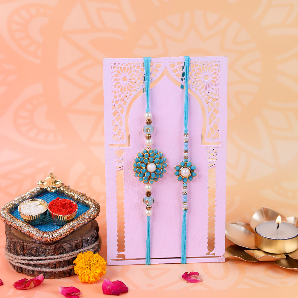 Exquisite Turquoise Floral Rakhi Set of 2 with Premium Puja Thali