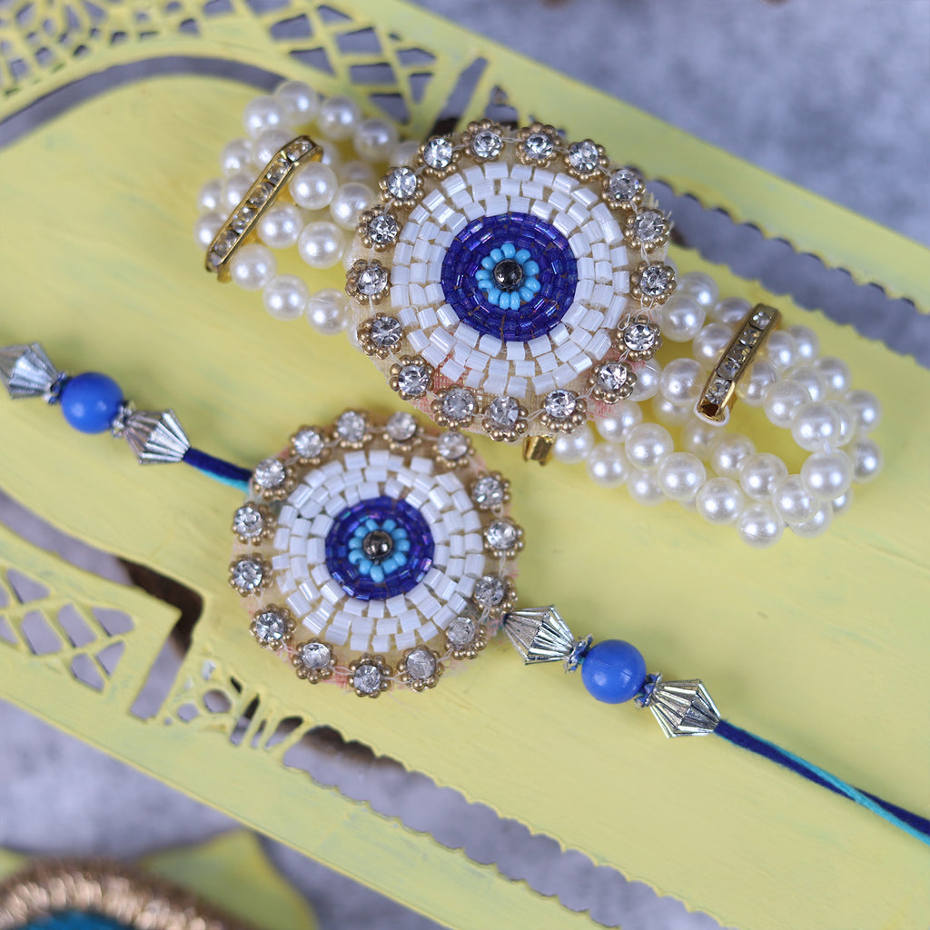 Handcrafted Evil Eye Rakhi & Triple-Strand Pearl Lumba Set with Coordinated Mini Puja Thali