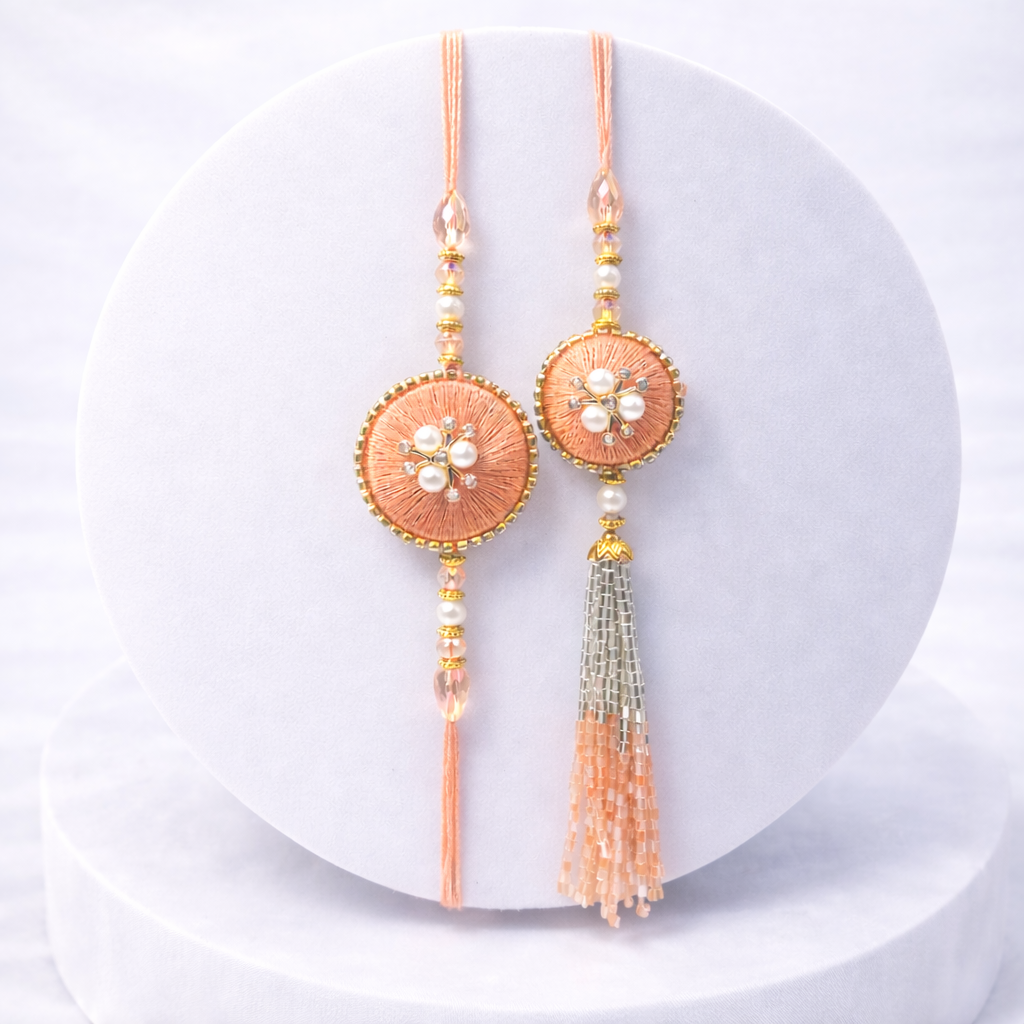 Handcrafted Peach Silk & Pearl Bhaiya Bhabhi Rakhi Set