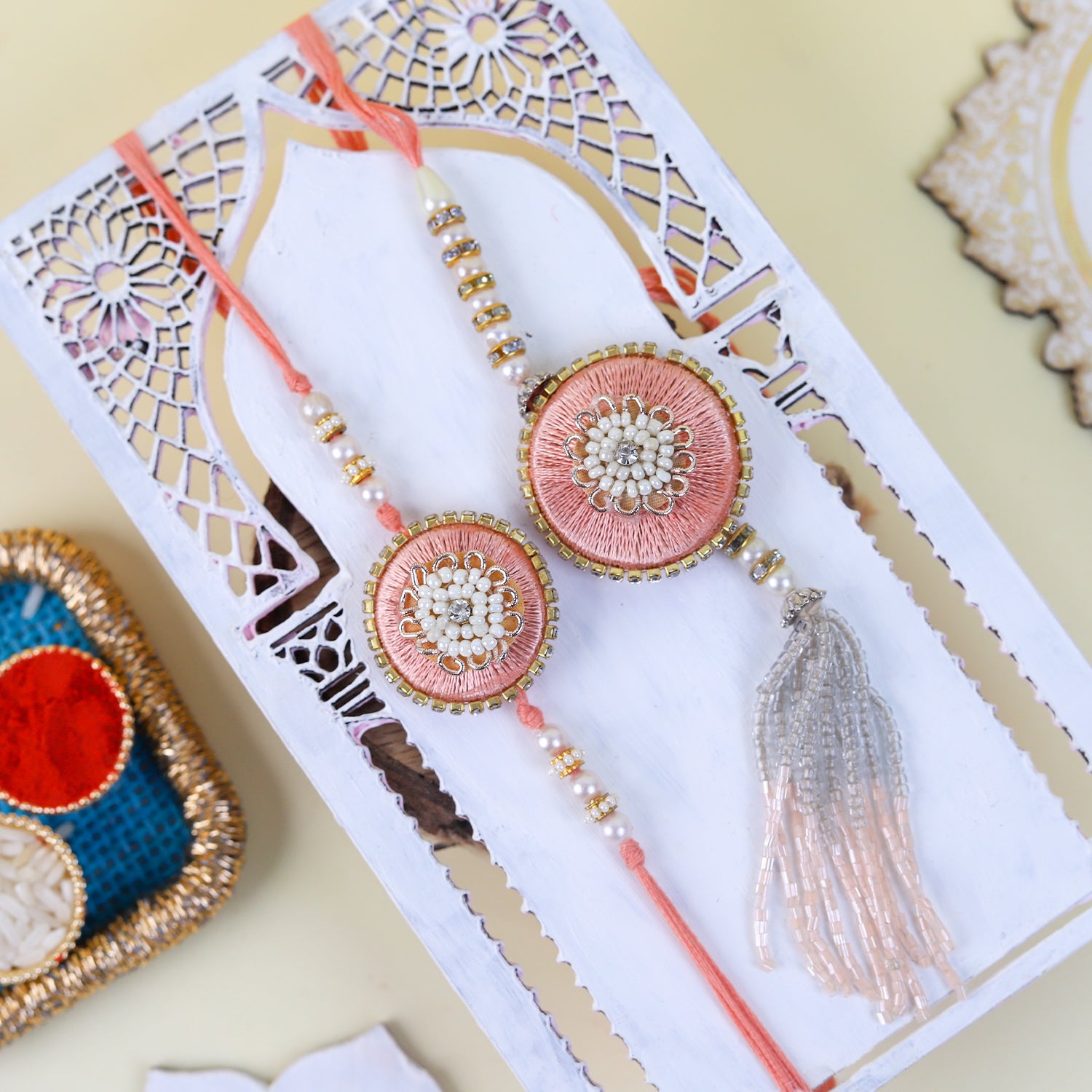 Handcrafted Peach Silk & Pearl Bhaiya Bhabhi Rakhi Set with Matching Puja Thali