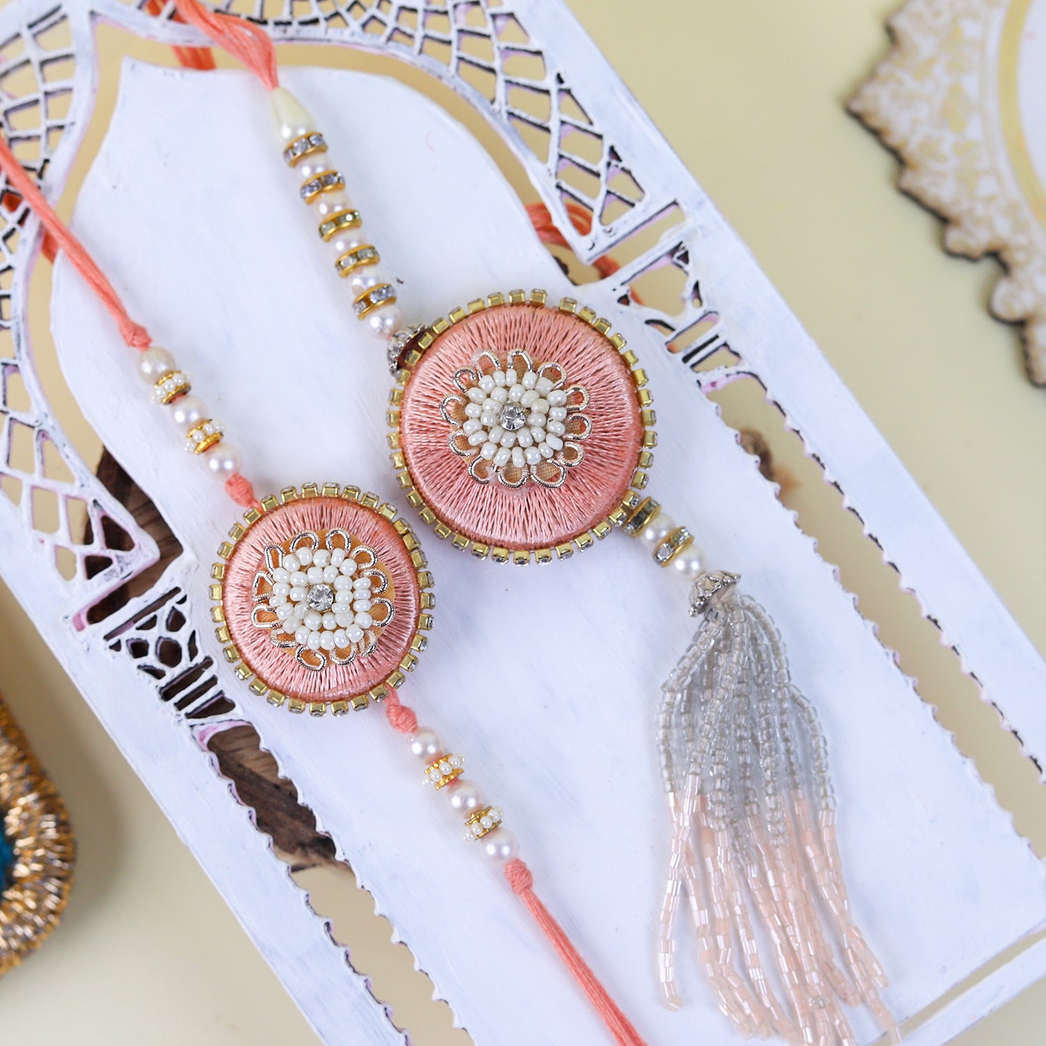 Handcrafted Peach Silk & Pearl Bhaiya Bhabhi Rakhi Set with Matching Puja Thali