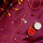 Sacred Silver Shiva Trishul & Damru Rakhi – Handcrafted Mauli Thread for Brother