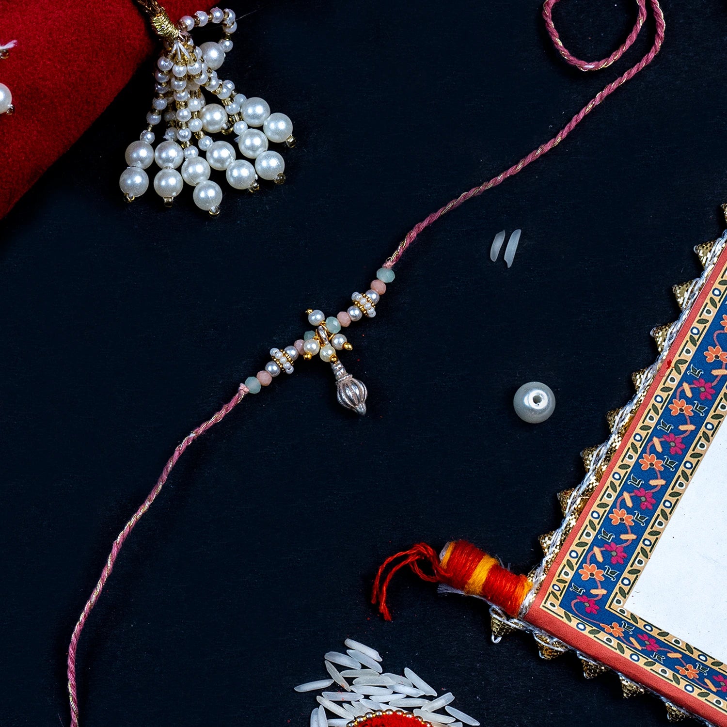 Divine Silver Charm Rakhi – Handcrafted Traditional Silk Thread for Brother