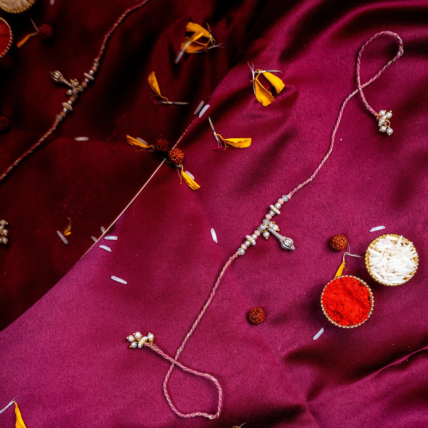 Divine Silver Charm Rakhi – Handcrafted Traditional Silk Thread for Brother