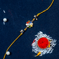 Divine Navratna Floral Rakhi – Handcrafted Multi-Color Stone Designer Thread for Brother