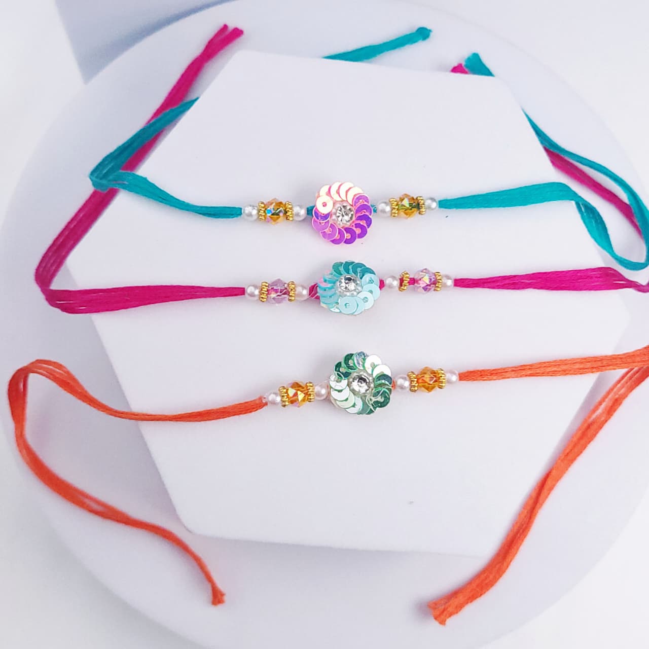 Designer Sequin Flower Rakhi (Set of 3)