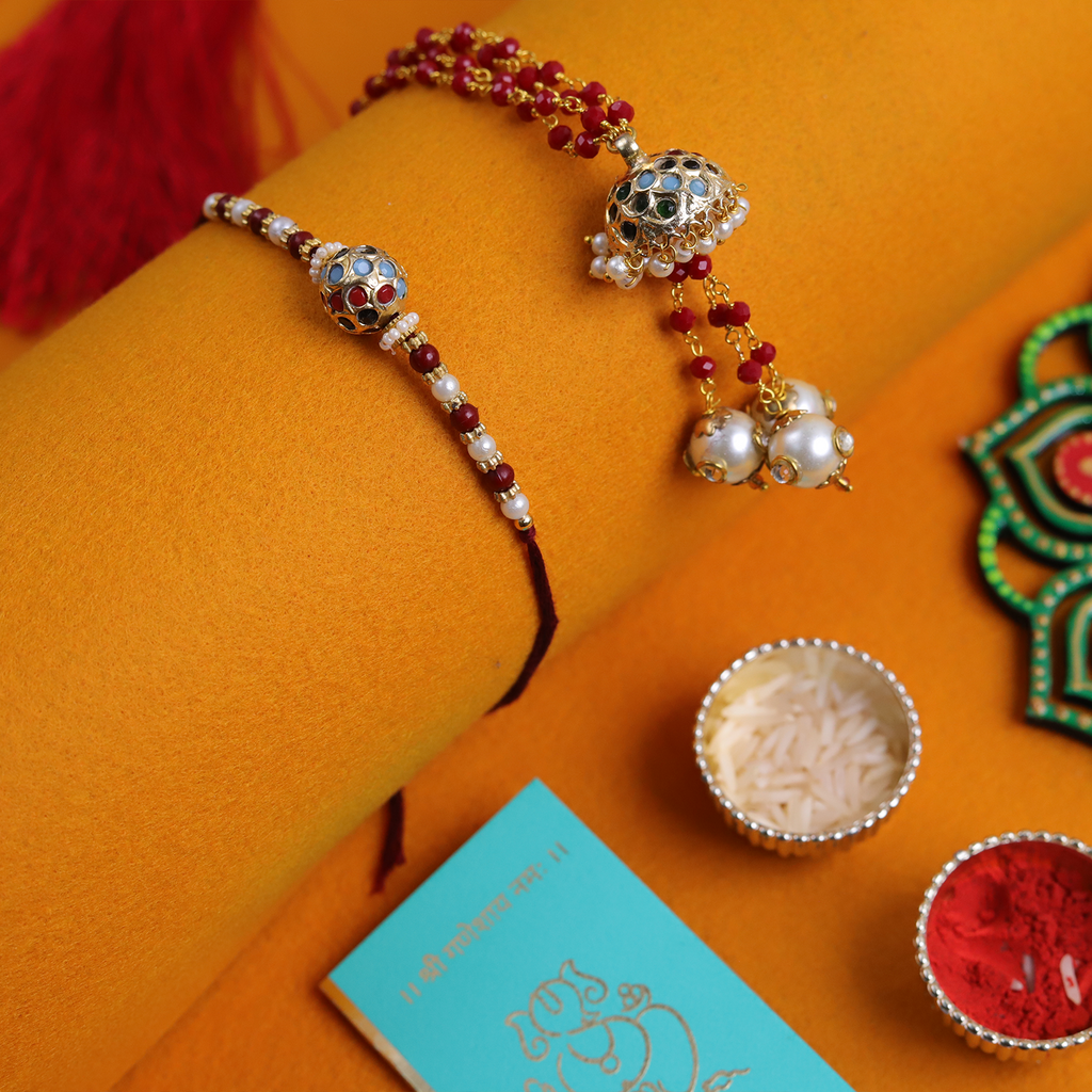 Handcrafted Bhaiya Bhabhi Rakhi Set – Royal Maroon & Pearl Combo with Roli-Chawal