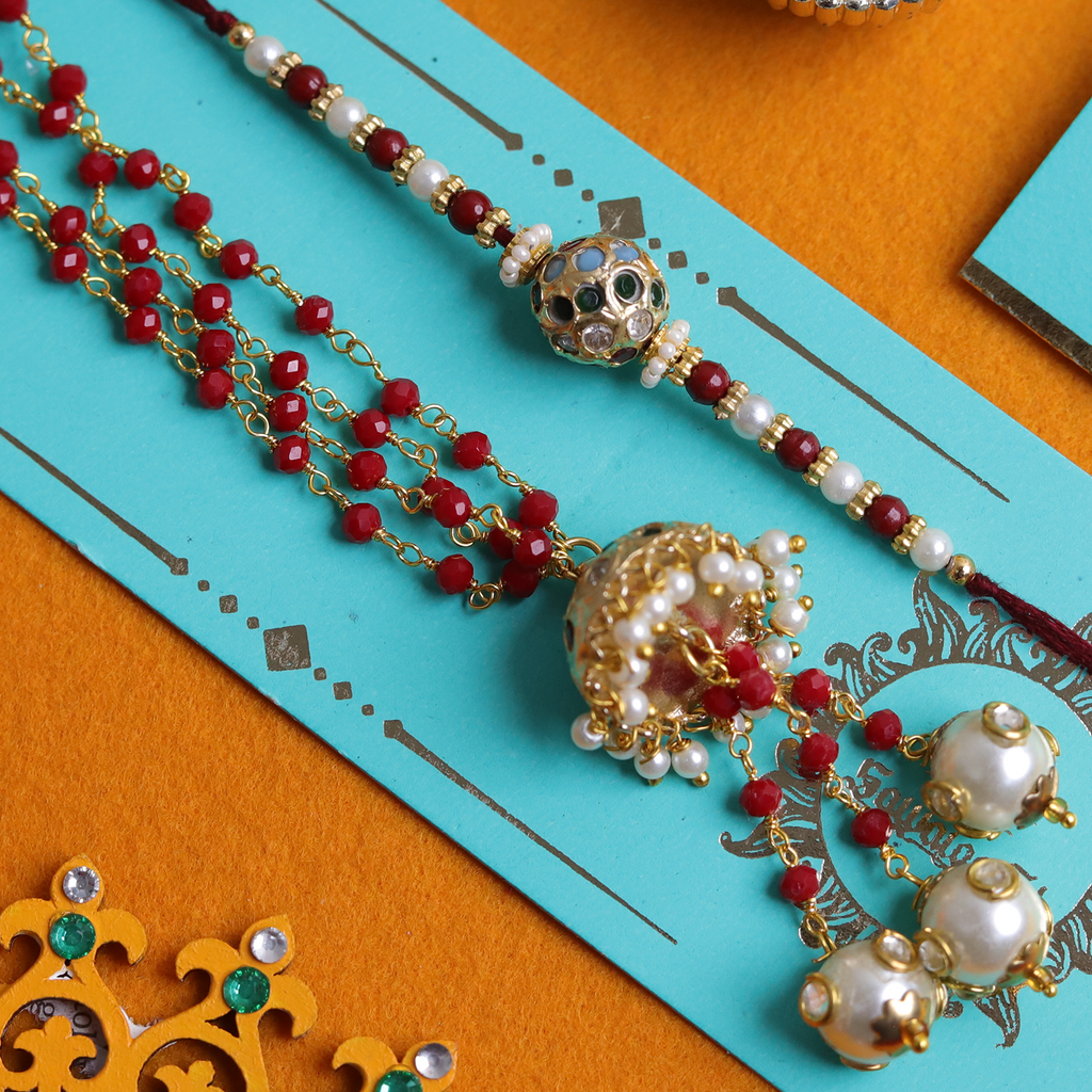 Handcrafted Bhaiya Bhabhi Rakhi Set – Royal Maroon & Pearl Combo with Roli-Chawal