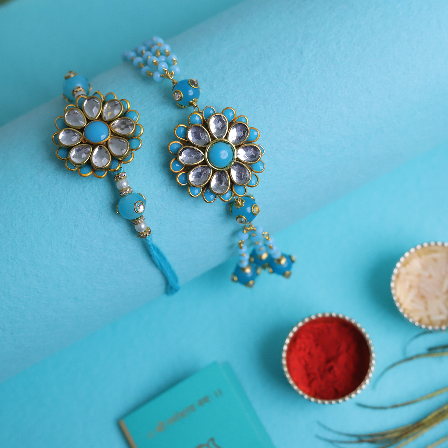 Handcrafted Turquoise Bhaiya Bhabhi Rakhi Set – Floral Kundan Couple Collection
