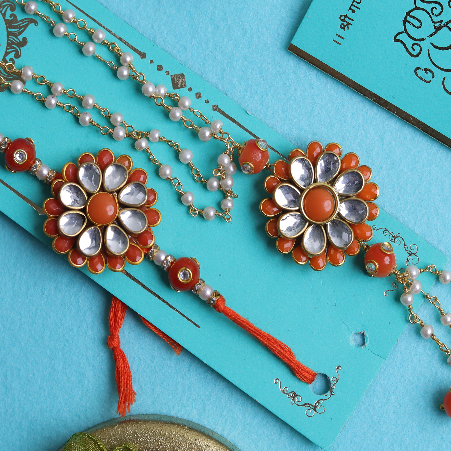 Vibrant Orange Floral Kundan Bhaiya Bhabhi Rakhi Set – Handcrafted Couple Collection