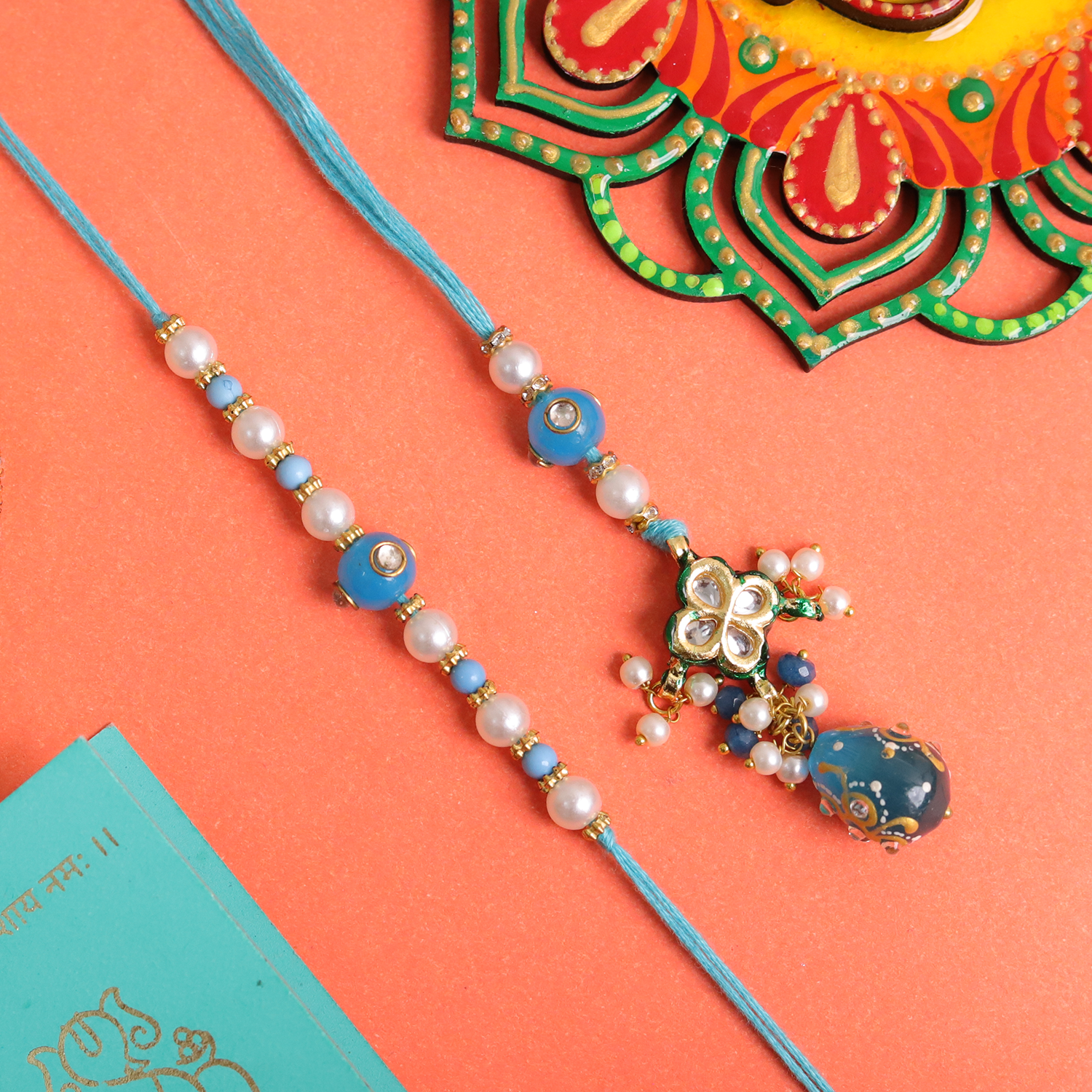 Exquisite Blue Floral Bhaiya Bhabhi Rakhi Set – Handcrafted Pearl & Kundan Collection