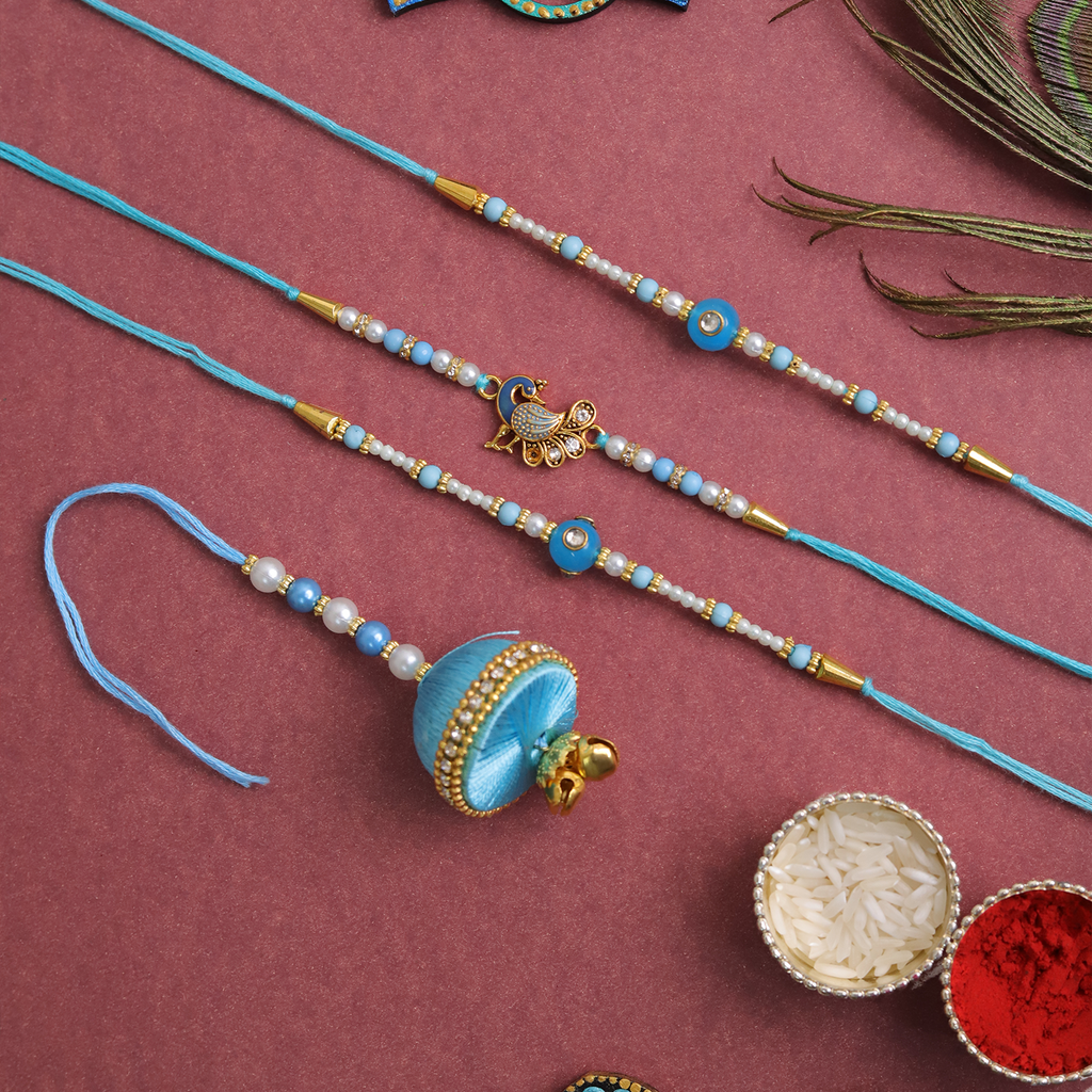 Set of 4 Teal Peacock & Pearl Rakhi Combo – 3 Rakhi & 1 Lumba Set