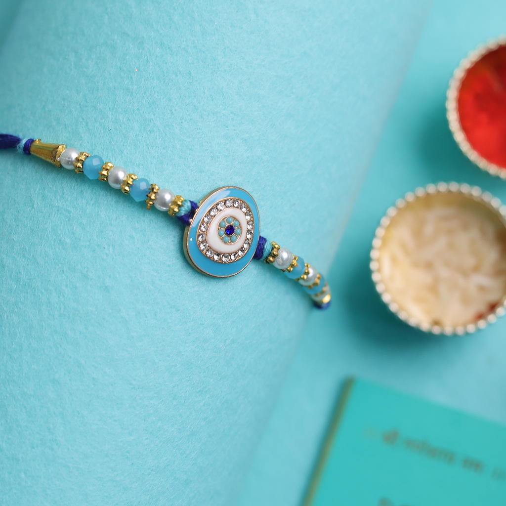 Guardian's Grace: Celestial Blue Evil Eye Designer Single Rakhi
