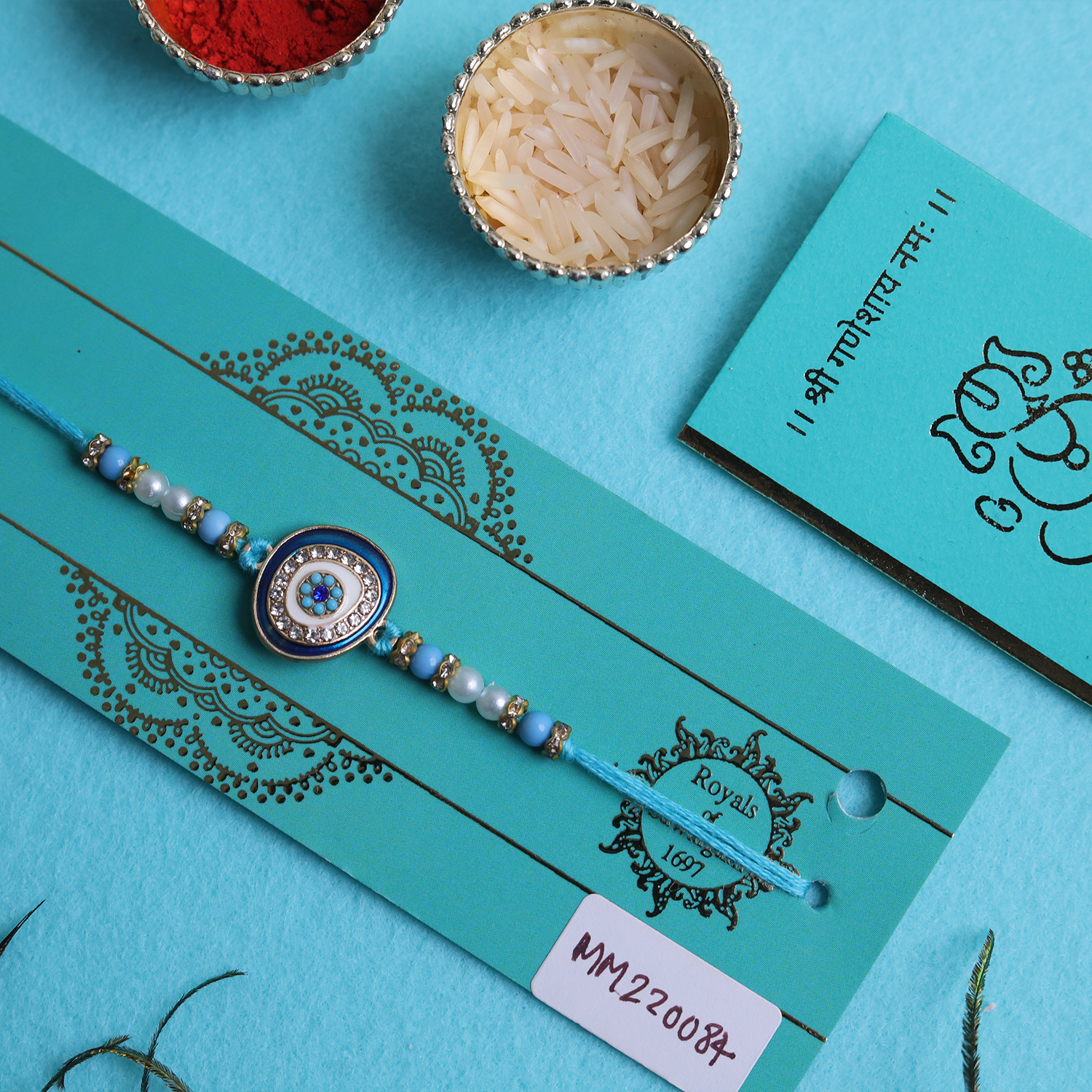 Guardian's Grace: Celestial Blue Evil Eye Designer Single Rakhi