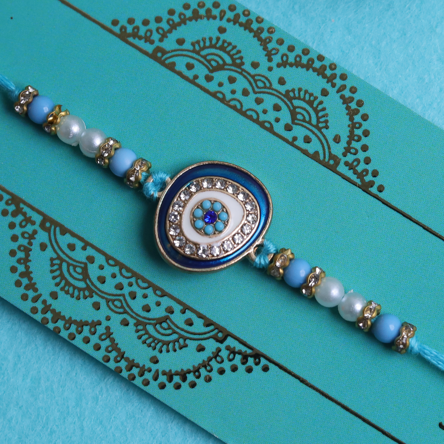 Guardian's Grace: Celestial Blue Evil Eye Designer Single Rakhi
