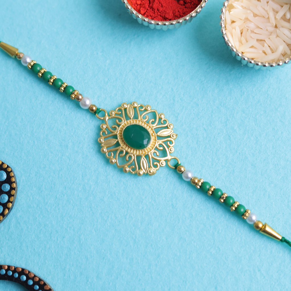 Regal Elegance: Emerald Green & Gold Filigree Designer Single Rakhi