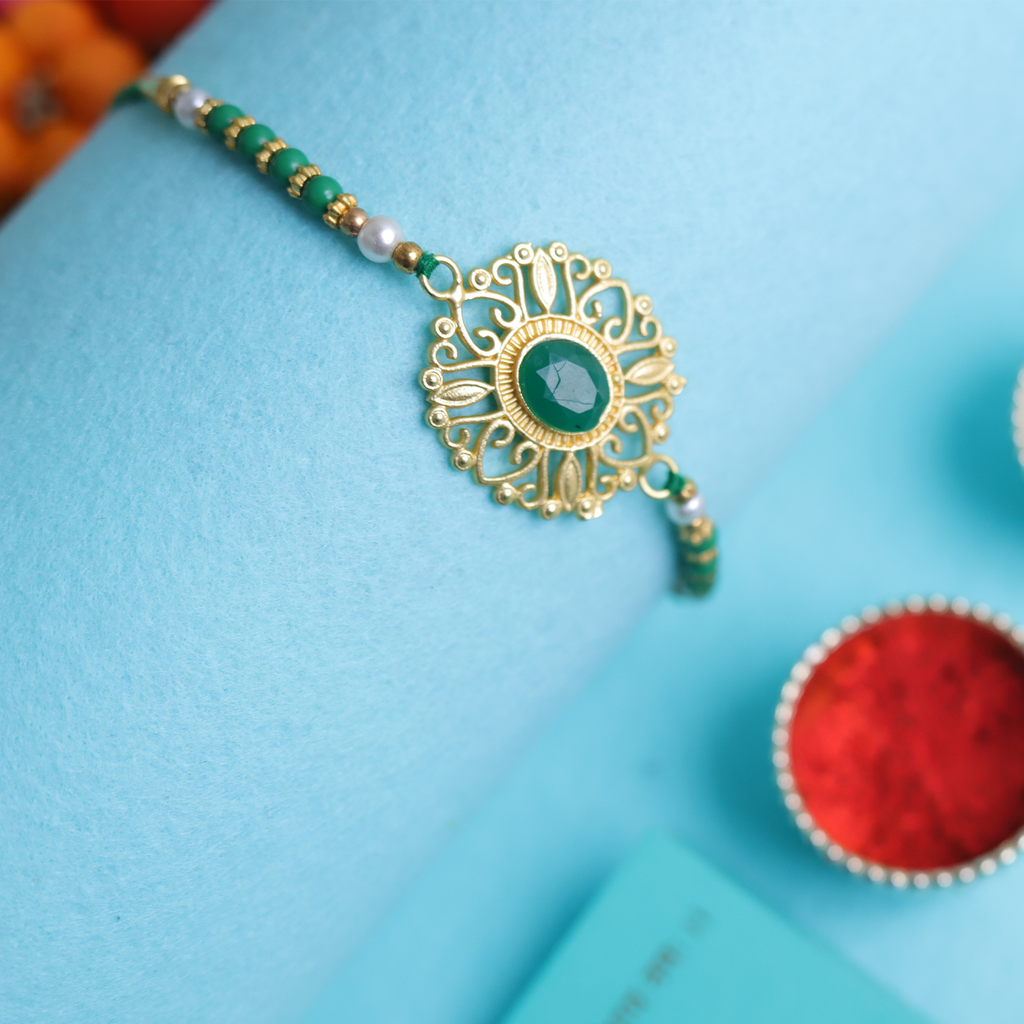 Regal Elegance: Emerald Green & Gold Filigree Designer Single Rakhi