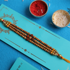 Sacred Bond: Triple-Strand Rudraksha & Sandalwood Designer Rakhi