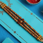 Sacred Bond: Triple-Strand Rudraksha & Sandalwood Designer Rakhi