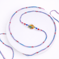 Peacock Motif Rakhi with Beads