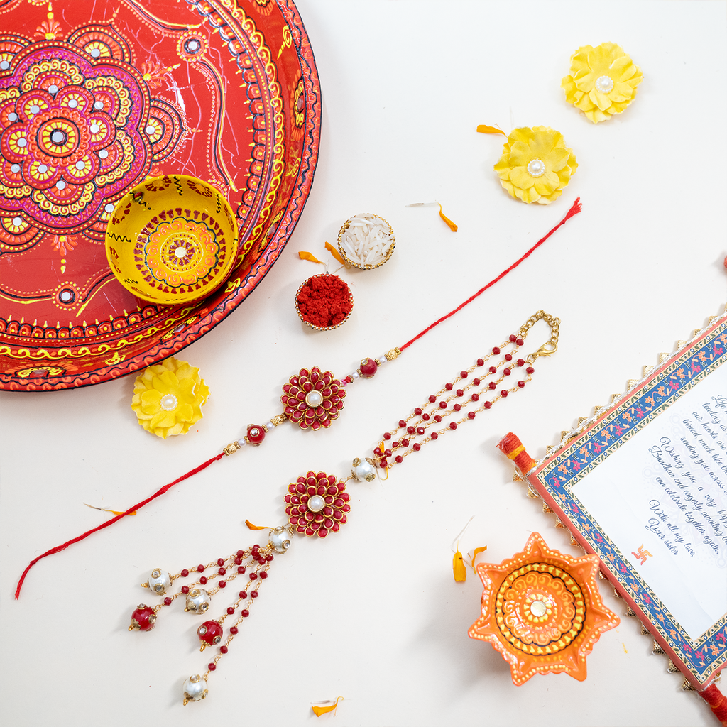 Royal Red Floral Bhaiya Bhabhi Rakhi Set – Handcrafted Couple Collection with Heartfelt Scroll