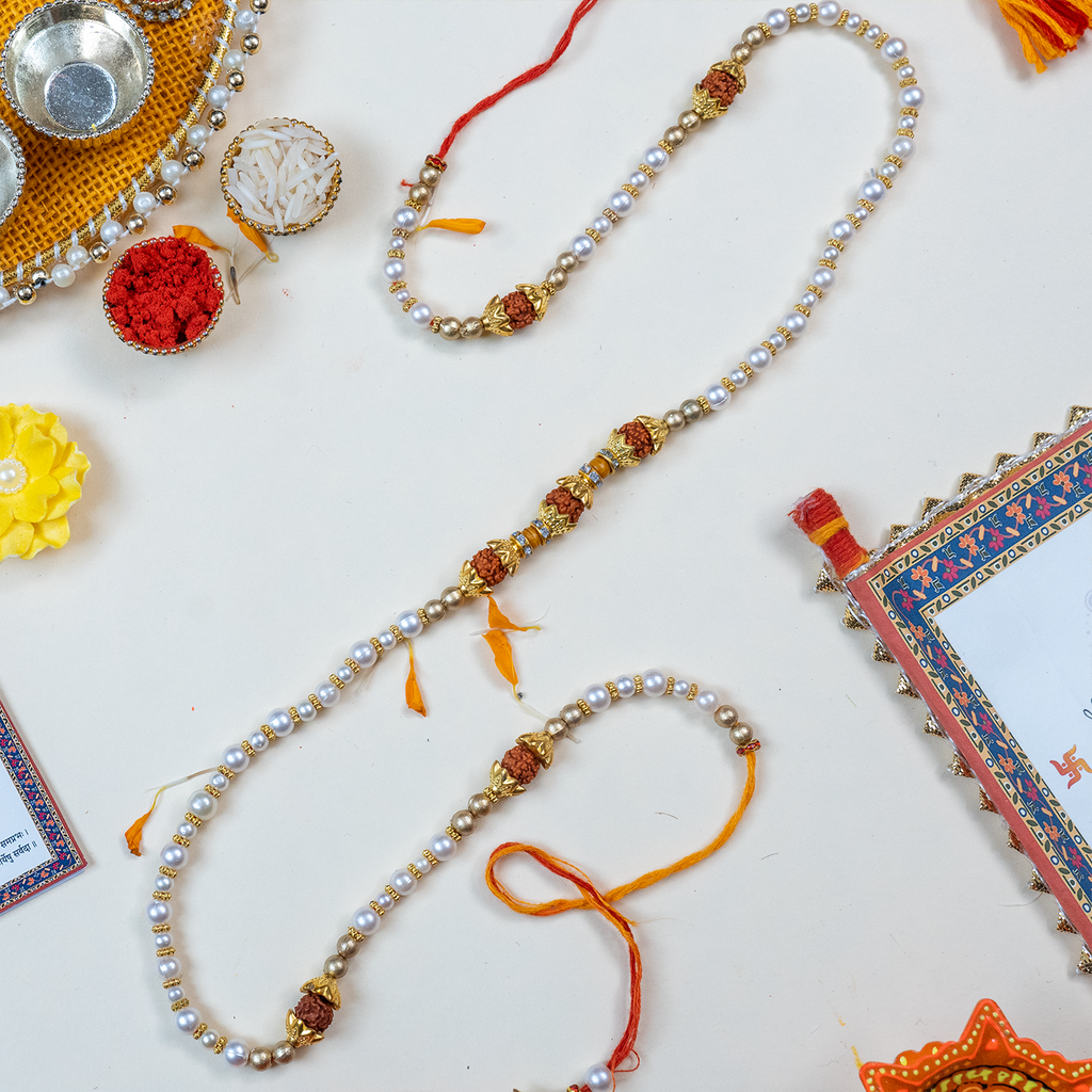 Handcrafted Bhaiya Bhabhi Rakhi Thali Set – Rudraksha & Pearl Edition with Scroll Message Card