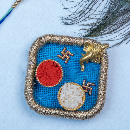 Divine Peacock Bhaiya Bhabhi Rakhi Set – Handcrafted Thali Collection with Blue Net Potli