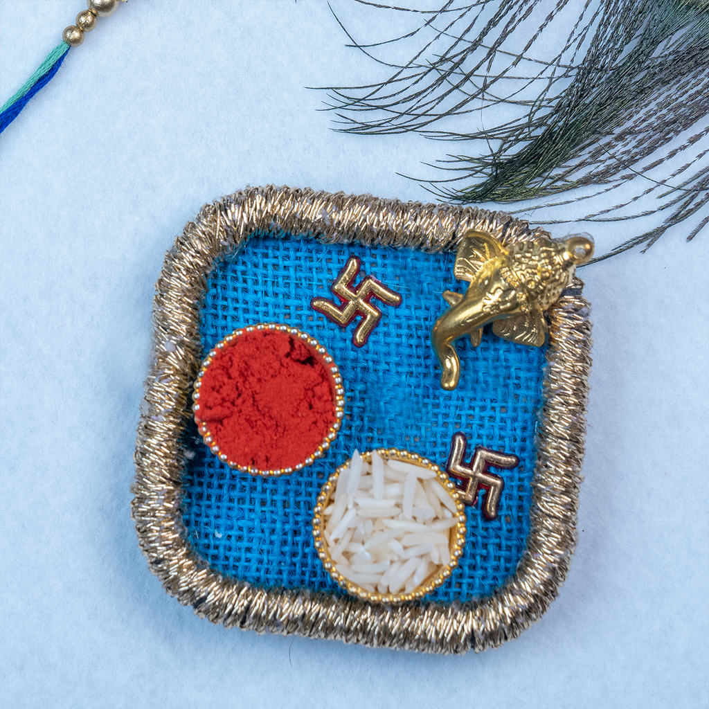 Designer Green Stone Rakhi with Blue Mesh Potli & Roli-Chawal Set