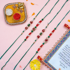 Premium Set of 4 Designer Rakhi with Handcrafted Thali & Festive Scroll