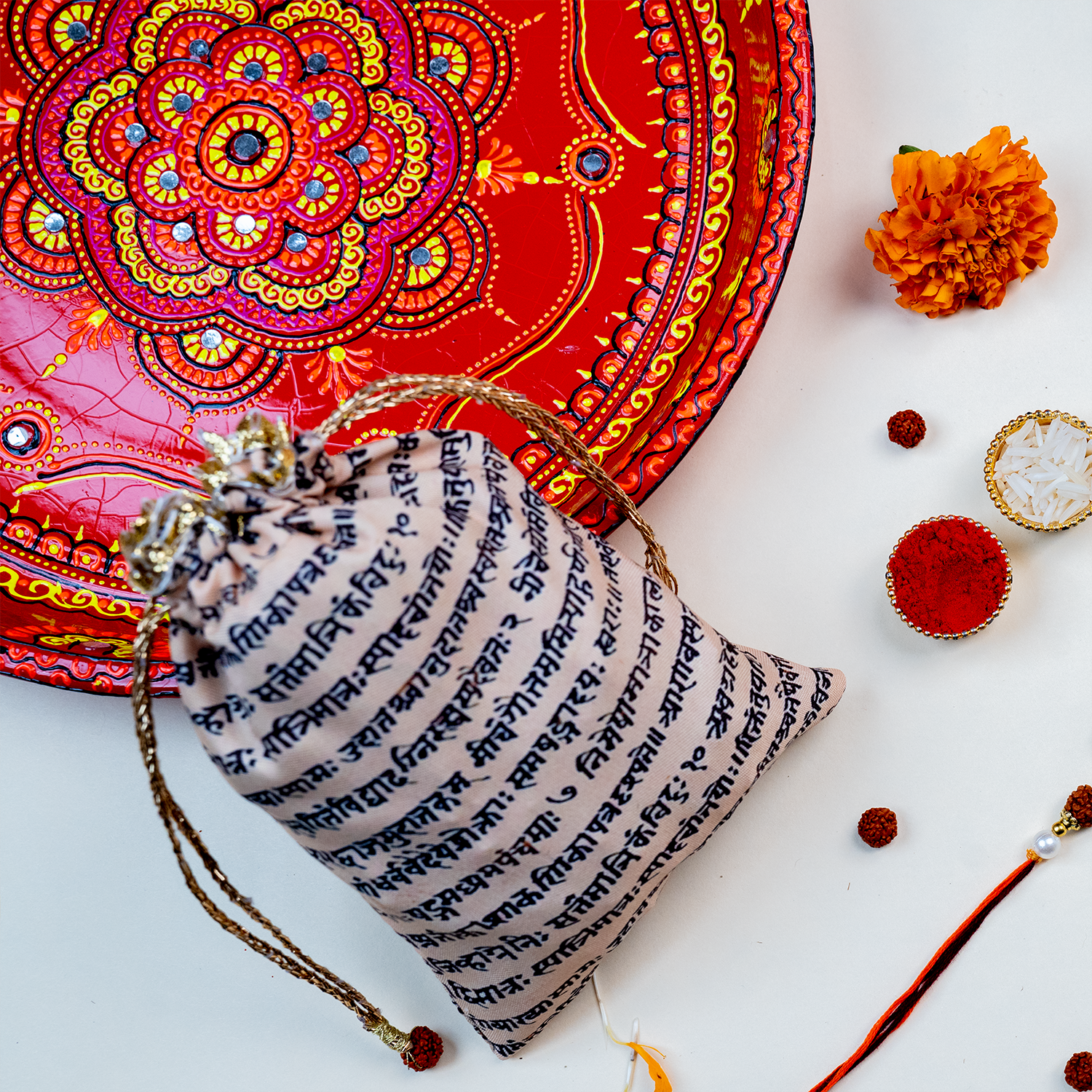 Divine Om & Rudraksha Rakhi Gift Set with Personalized Message Scroll, Roli-Chawal, and Handcrafted Potli