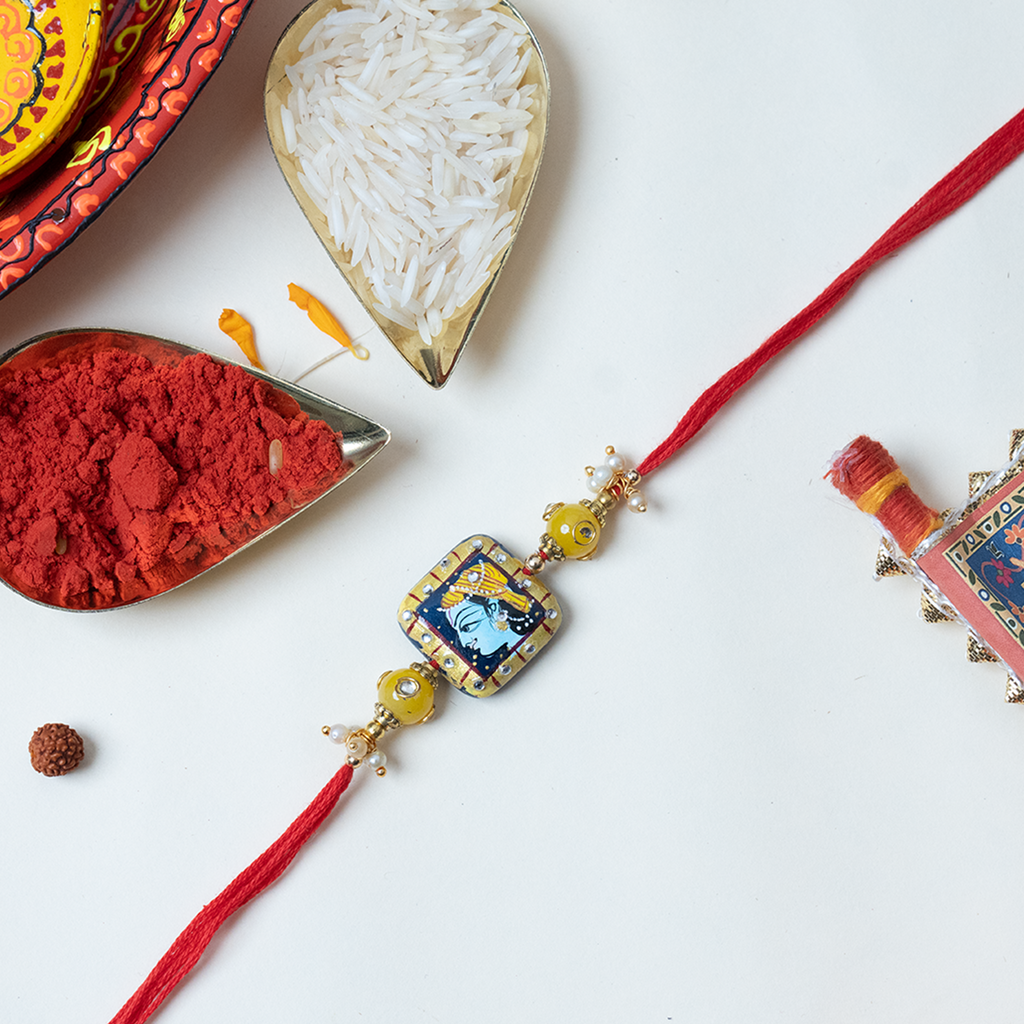 Exquisite Lord Krishna Hand-Painted Rakhi Gift Set with Divine Message Scroll, Roli-Chawal Kit, and Handcrafted Shloka Potli