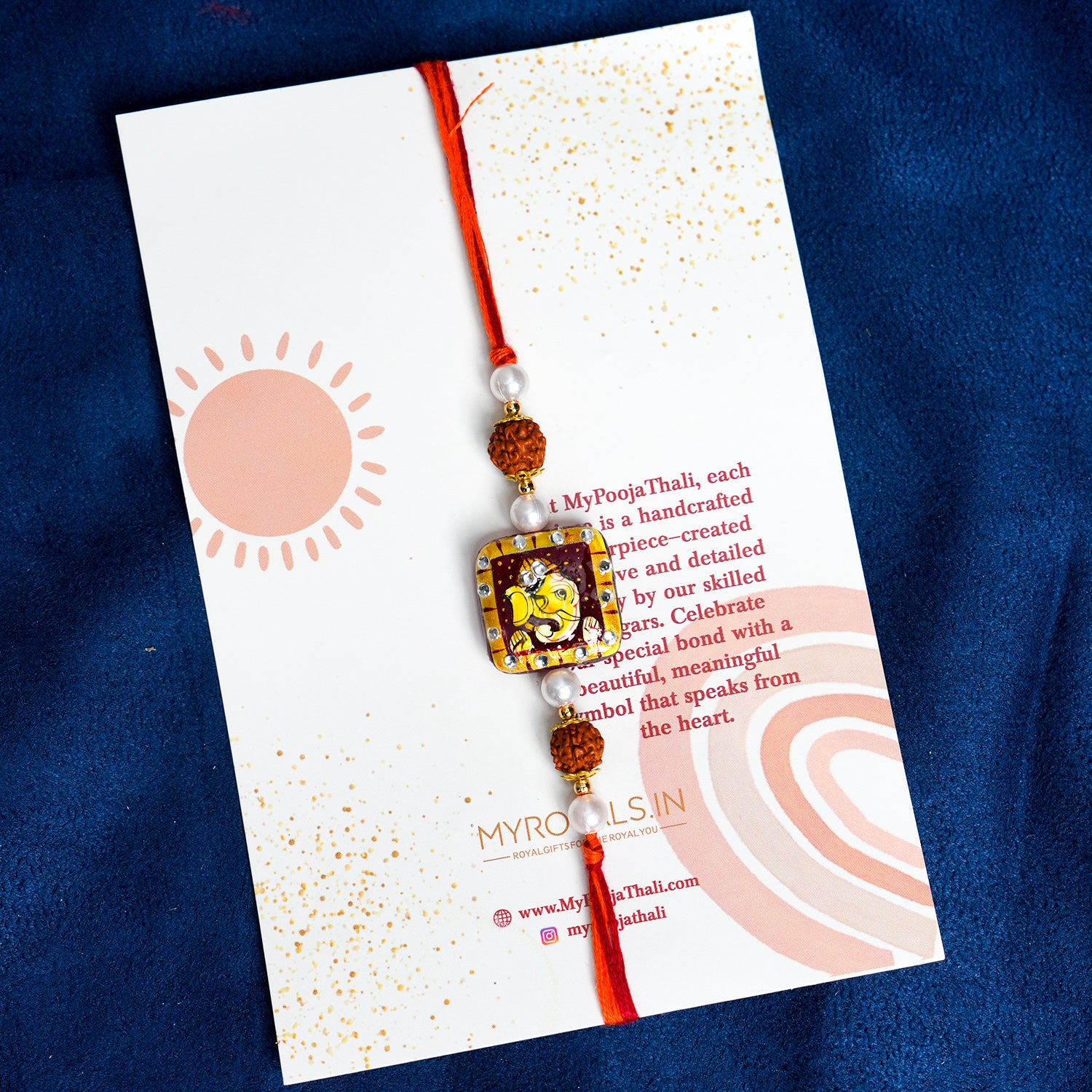 Traditional Divine Ganesha & Pearl Bhaiya Bhabhi Rakhi Combo with Hand-Painted Potli & Scroll Card