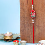 Red Floral Rose Designer Rakhi with Roli-Chawal & Ganesha Card