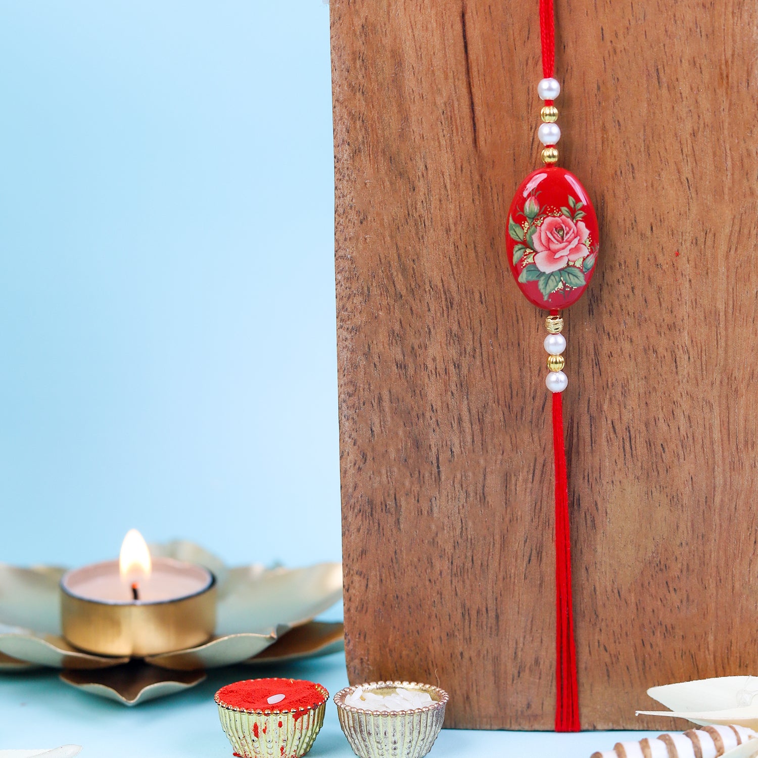 Red Floral Rose Designer Rakhi with Roli-Chawal & Ganesha Card