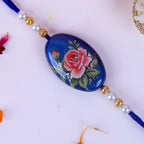 Designer Floral Rose Rakhi Set with Roli-Chawal & Ganesha Blessing Card