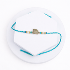 Brass Krishna Calligraphy Rakhi
