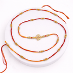 Red & Yellow Thread Rakhi with Trishul Center