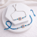Blue Evil Eye Rakhi & Bracelet Set